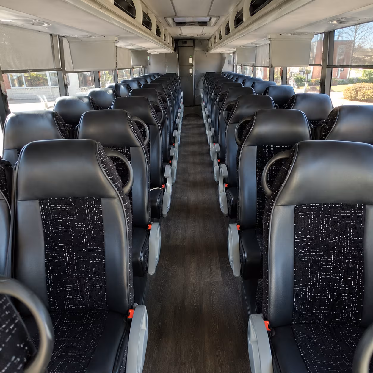 tracy 54 passenger charter bus inside